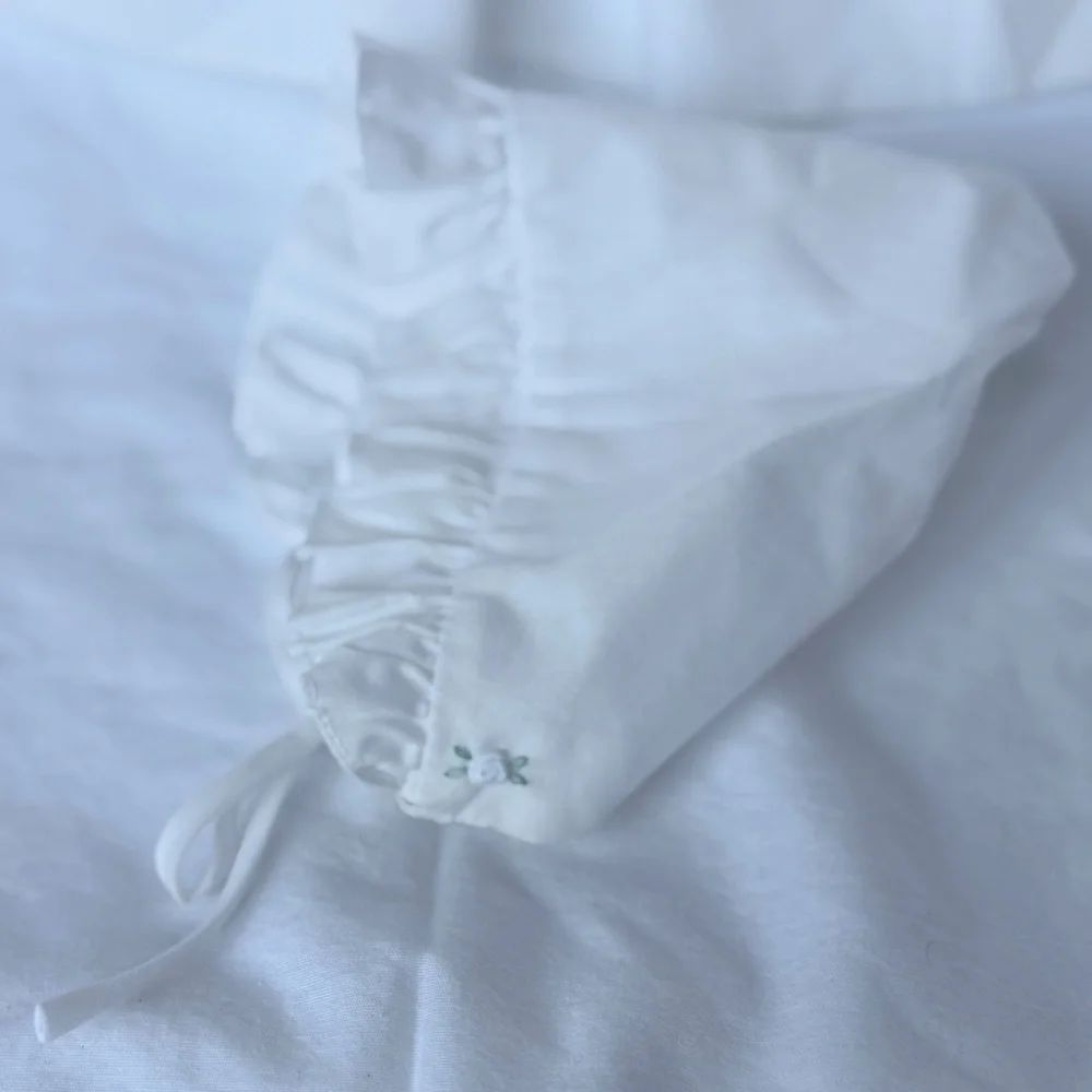 Petit Ami White Hand Embroidered Baby gown with bonnet